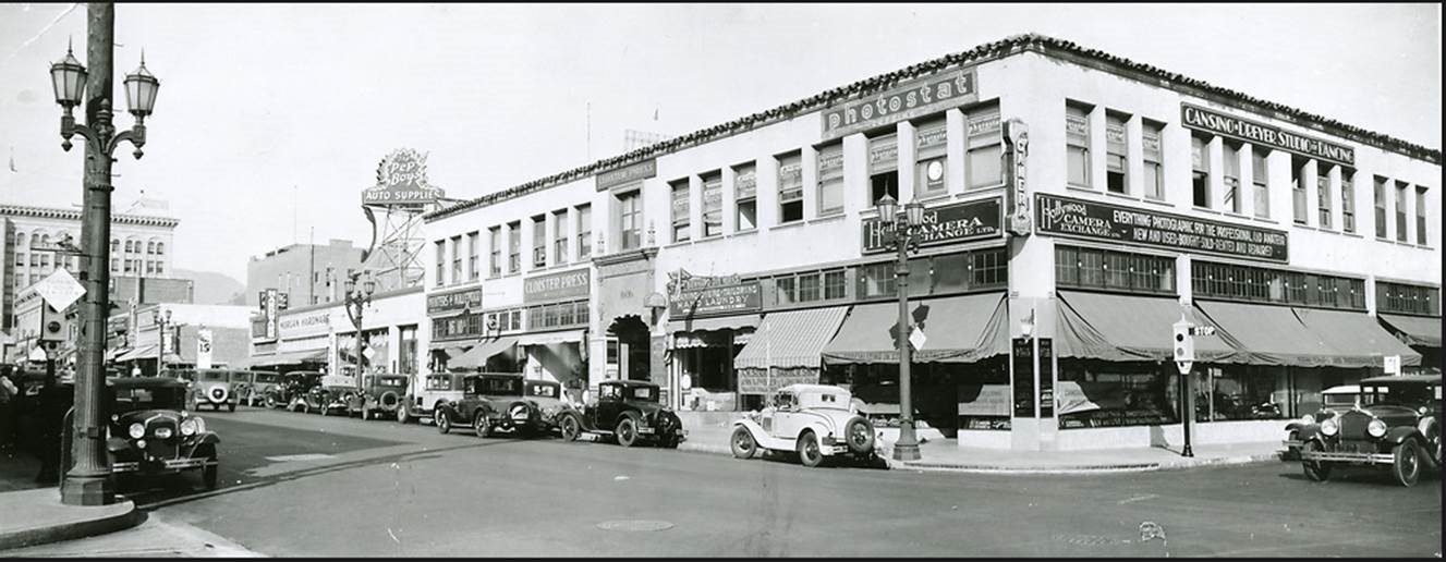 Historic black-and-white street view of the Cahuenga and Selma building with early storefront and dance-studio signage
