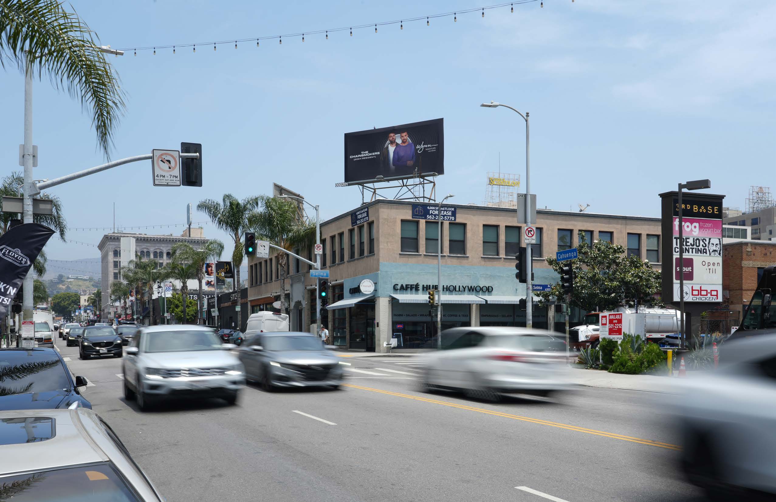 Existing condition: static Clear Channel billboard above the same corner, northbound Cahuenga Boulevard